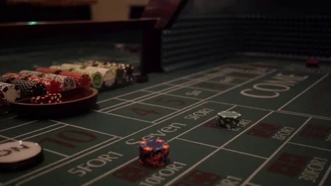 Dice being tossed on a craps table Stock Footage