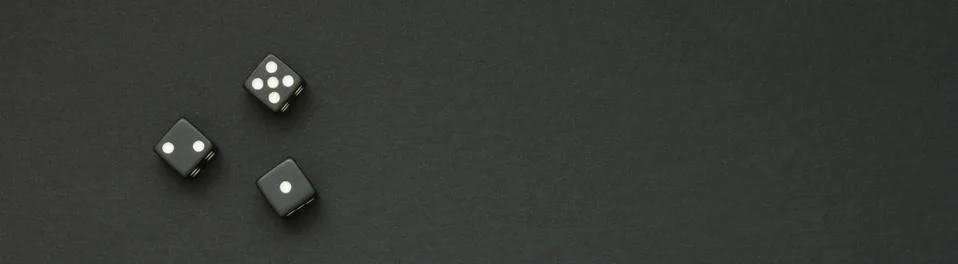 Dice on a black background, for text 写真素材