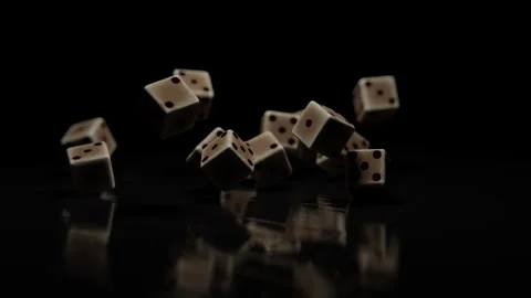 Dice cubes falling on a wooden table against a dark background Stock Footage 253560329