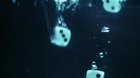 Dice Drop and Ripple Through Water Stock Footage 300888177