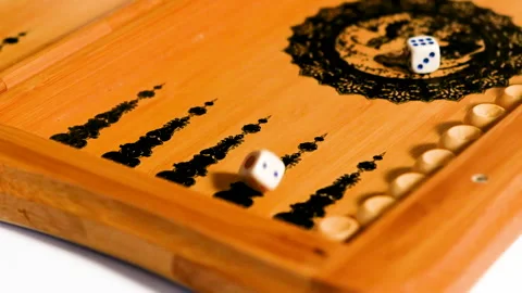 The dice fall onto the backgammon board, six, five. Stock Footage 166361996