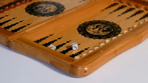 The dice fall onto the backgammon board, two are two. Stock Footage 165265897