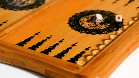 The dice fall onto the backgammon board, two are four. Stock Footage 166220124