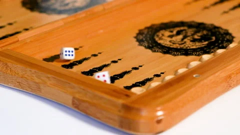 The dice fall onto the backgammon board, two are three. Stock Footage 170479359