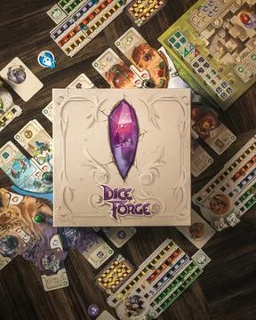 Dice Forge board game components close up with custom dice tokens cards 스톡 사진