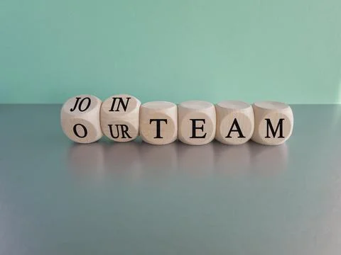 Dice form the expression join our team. Beautiful blue background Foto stock
