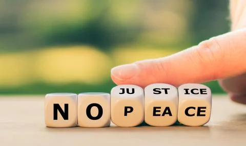 Dice form the expression "no justice no peace". Stock Photos
