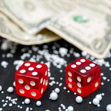 Dice game. Dice on the table.  Dollar bills. Stock Photos