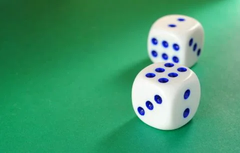 Dice on a green background Stock-Fotos