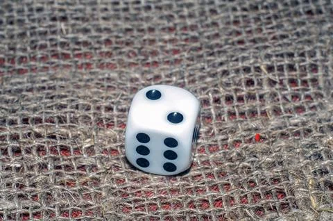 Dice on grey background. two points up with six. Stock Photos