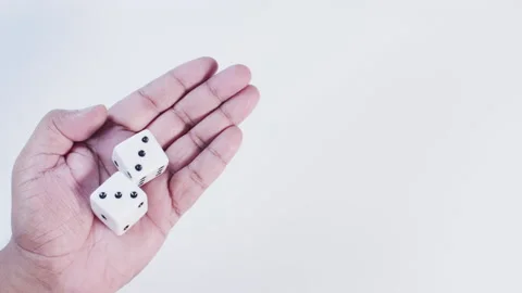 Dice in Hand - 2 THREES Video stock 134570676