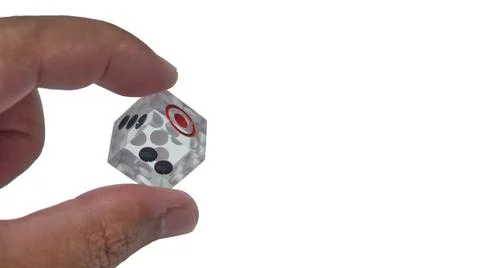 Dice in hand Stock Photos