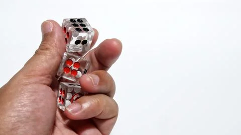 Dice in hand Stock Photos