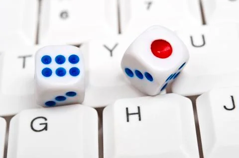 Dice on keyboard Foto stock