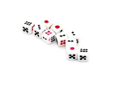 Dice lined on the white floor Stock Photos