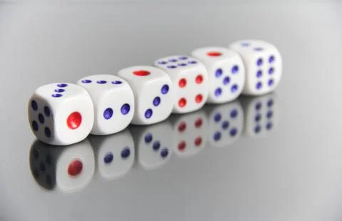 Dice on mirror reflection Stock Photos