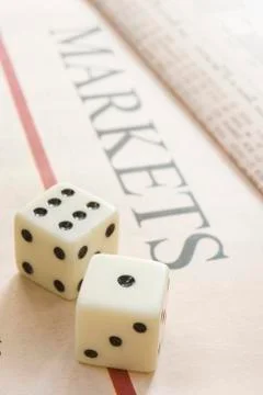 Dice on a paper Stock Photos