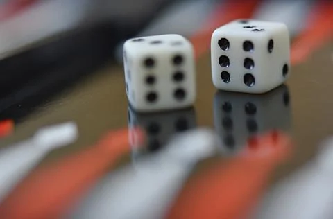 Dice playing on the backgammon boardtake two sixes on the dice. Luck Stock Photos