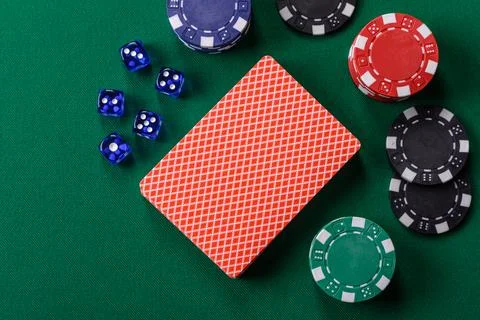 Dice poker game with chips, bets and risk in casino. Dice poker Stock Photos
