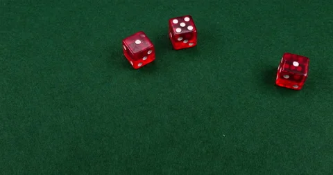 Dice Roll D6 6 Sided Transparent Red Die Green Background Rolling 1-5-1 Video stock 203096878