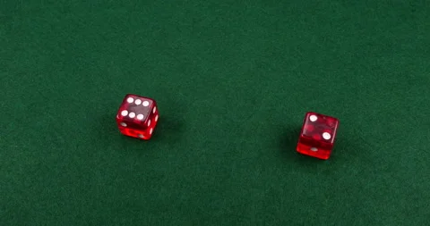 Dice Roll D6 6 Sided Transparent Red Die Green Background Rolling 6-2 Stock Footage 203112839