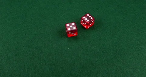 Dice Roll D6 6 Sided Transparent Red Die Green Background Rolling 5-6 Stock Footage 203115204