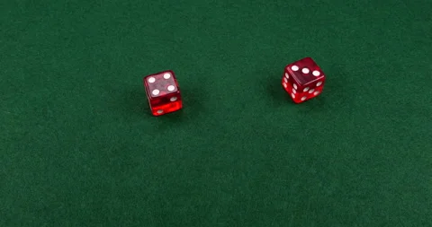 Dice Roll D6 6 Sided Transparent Red Die Green Background Rolling 4-3 Stock Footage 203121561