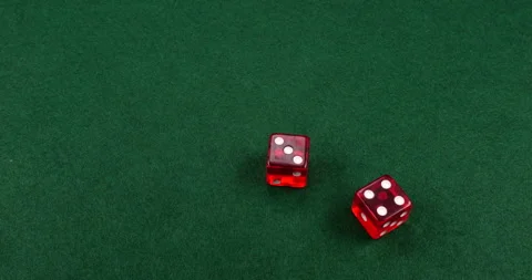 Dice Roll D6 6 Sided Transparent Red Die Green Background Rolling 3-4 Stock Footage 203125387