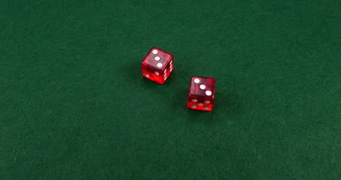 Dice Roll D6 6 Sided Transparent Red Die Green Background Rolling 3-3 Video stock 203141026