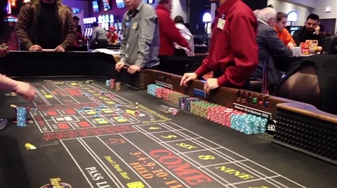 Dice rolling across a craps table Stock Footage 44455187