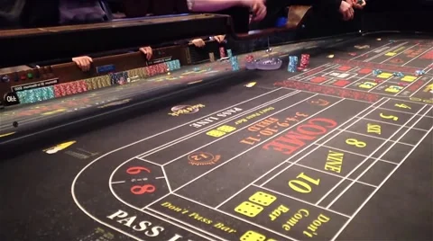 Dice rolling across a craps table Stock Footage 45207474