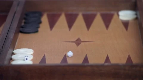 Dice rolling long on a backgammon game Stock Footage 68025622