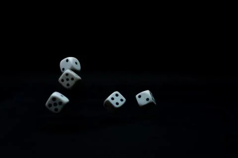 Dice rolling Stock Photos