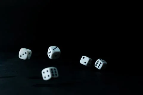 Dice rolling Stock Photos