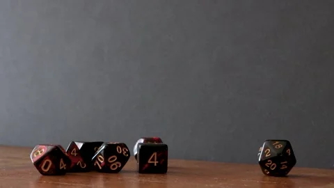 Dice rolling on a table Stock Footage 335943089