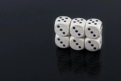 Dice six triples on a black background Stock Photos