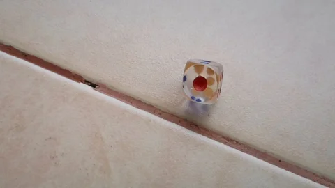 Dice spin on the floor. (slow motion footage 960fps) Stock Footage 111631479