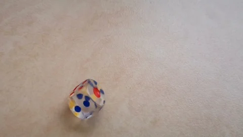 Dice spin on the floor. (slow motion footage 960fps) Stock Footage 111631540