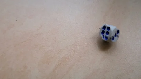 Dice spin on the floor. (slow motion footage 960fps) Stock Footage 111631685