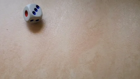 Dice spin on the floor. (slow motion footage 960fps) Stock Footage 111631805