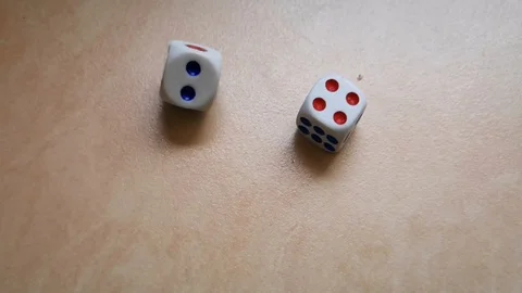 Dice spin on the floor. (slow motion footage 960fps) Stock Footage 111631840