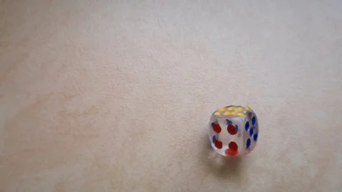 Dice spin on the floor. (slow motion footage 960fps) Stock Footage 111631878