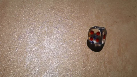 Dice spin on the floor. (slow motion footage 960fps) Stock Footage 111632080