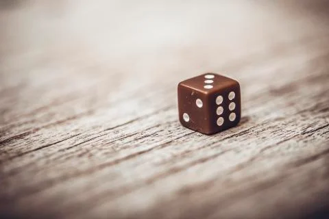 Dice on table, vintage effect. Background for casino games, gambling, luck or Stock Photos