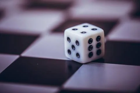 Dice on table, vintage effect. Background for casino games, gambling, luck or Stock Photos