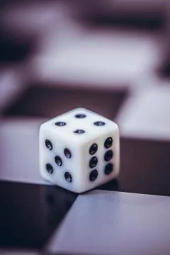 Dice on table, vintage effect. Background for casino games, gambling, luck or Stock Photos
