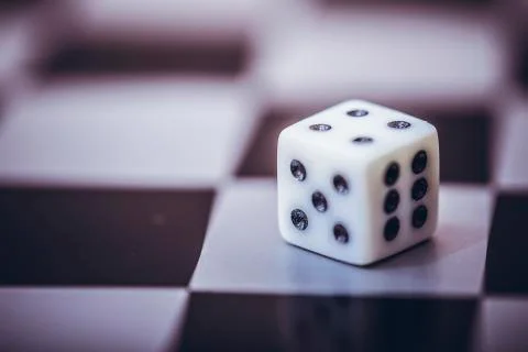 Dice on table, vintage effect. Background for casino games, gambling, luck or Stock Photos