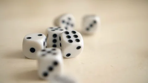 Dice thrown on table in slow motion. Stock Footage 95527359