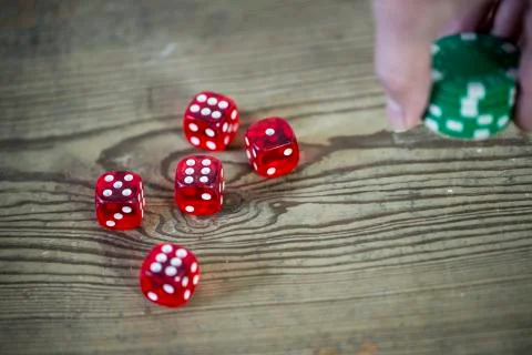 Dice on the wooden table  Stock Photos