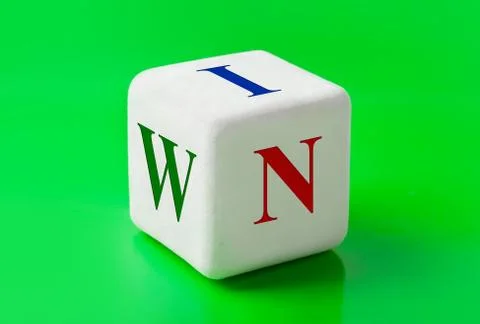 Dice with word Win Stock Photos